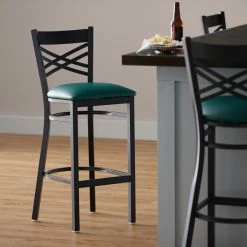 Lancaster Table & Seating Black Finish Cross Back Bar Stool With 2 1/2" Green Vinyl Padded Seat