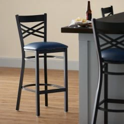 Lancaster Table & Seating Black Finish Cross Back Bar Stool With 2 1/2" Navy Vinyl Padded Seat