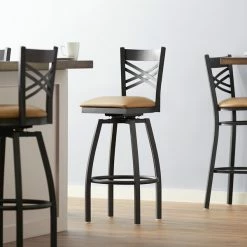 Lancaster Table & Seating Black Finish Cross Back Swivel Bar Stool With 2 1/2" Light Brown Vinyl Padded Seat