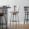 Lancaster Table & Seating Clear Coat Finish Cross Back Swivel Bar Stool With 2 1/2" Light Brown Vinyl Padded Seat