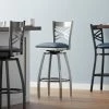 Lancaster Table & Seating Clear Coat Finish Cross Back Swivel Bar Stool With 2 1/2" Navy Vinyl Padded Seat