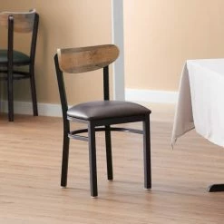 LT&S Boomerang Series Lancaster Table & Seating Boomerang Black Finish Chair With 2 1/2" Dark Brown Vinyl Padded Seat And Driftwood Back