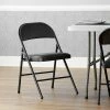 Lancaster Table & Seating Black Vinyl Folding Chair With Padded Seat