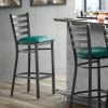 Lancaster Table & Seating Black Finish Ladder Back Bar Stool With 2 1/2" Green Vinyl Padded Seat