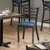 Lancaster Table & Seating Black Finish Ladder Back Chair With 2 1/2" Navy Vinyl Padded Seat