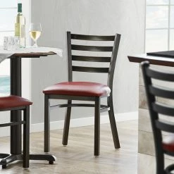 Lancaster Table & Seating Distressed Copper Finish Ladder Back Chair With 2 1/2" Burgundy Vinyl Padded Seat
