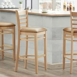 Lancaster Table & Seating Natural Ladder Back Bar Height Chair With 2 1/2" Light Brown Padded Seat