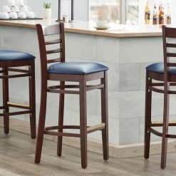 Lancaster Table & Seating Mahogany Ladder Back Bar Height Chair With Navy Padded Seat