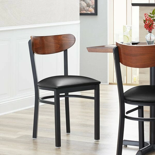 LT&S Boomerang Series Lancaster Table & Seating Boomerang Black Finish Chair With 2 1/2" Black Vinyl Padded Seat And Antique Walnut Wood Back 1 LT&S Boomerang Series Lancaster Table & Seating Boomerang Black Finish Chair With 2 1/2" Black Vinyl Padded Seat And Antique Walnut Wood Back