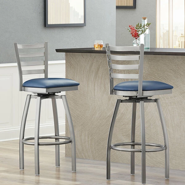 Lancaster Table & Seating Clear Coat Finish Ladder Back Swivel Bar Stool With 2 1/2" Navy Vinyl Padded Seat 1 Lancaster Table & Seating Clear Coat Finish Ladder Back Swivel Bar Stool With 2 1/2" Navy Vinyl Padded Seat