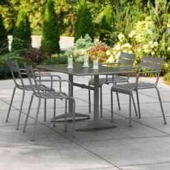 Lancaster Table & Seating 32" X 48" Matte Gray Powder-Coated Aluminum Dining Height Outdoor Table With Umbrella Hole And 4 Arm Chairs