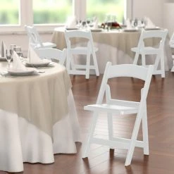 Lancaster Table & Seating White Resin Folding Chair With Vinyl Seat