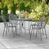Lancaster Table & Seating Harbor Black 36" Round Outdoor Standard Height Table With Ornate Legs And 4 Arm Chairs