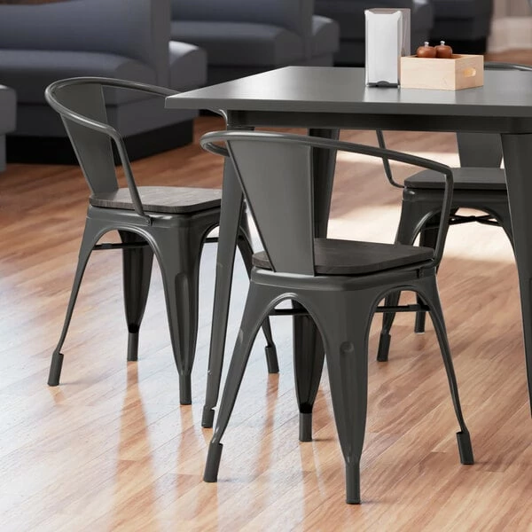 LT&S Alloy Series Lancaster Table & Seating Alloy Series Black Metal Indoor Industrial Cafe Arm Chair With Black Wooden Seat 1 LT&S Alloy Series Lancaster Table & Seating Alloy Series Black Metal Indoor Industrial Cafe Arm Chair With Black Wooden Seat