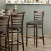Lancaster Table & Seating Vintage Finish Wooden Ladder Back Bar Height Chair With Dark Gray Padded Seat