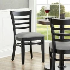 Lancaster Table & Seating Black Finish Wooden Ladder Back Chair With Light Gray Padded Seat