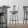 Lancaster Table & Seating Clear Coat Finish Cross Back Swivel Bar Stool With 2 1/2" Dark Gray Vinyl Padded Seat
