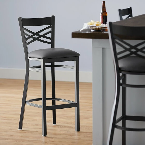 Lancaster Table & Seating Black Finish Cross Back Bar Stool With 2 1/2" Dark Gray Vinyl Padded Seat 1 Lancaster Table & Seating Black Finish Cross Back Bar Stool With 2 1/2" Dark Gray Vinyl Padded Seat