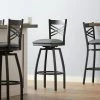 Lancaster Table & Seating Black Finish Cross Back Swivel Bar Stool With 2 1/2" Dark Gray Vinyl Padded Seat