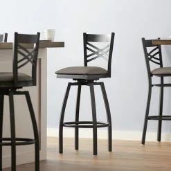 Lancaster Table & Seating Black Finish Cross Back Swivel Bar Stool With 2 1/2" Taupe Vinyl Padded Seat