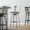 Lancaster Table & Seating Clear Coat Finish Cross Back Swivel Bar Stool With 2 1/2" Taupe Vinyl Padded Seat