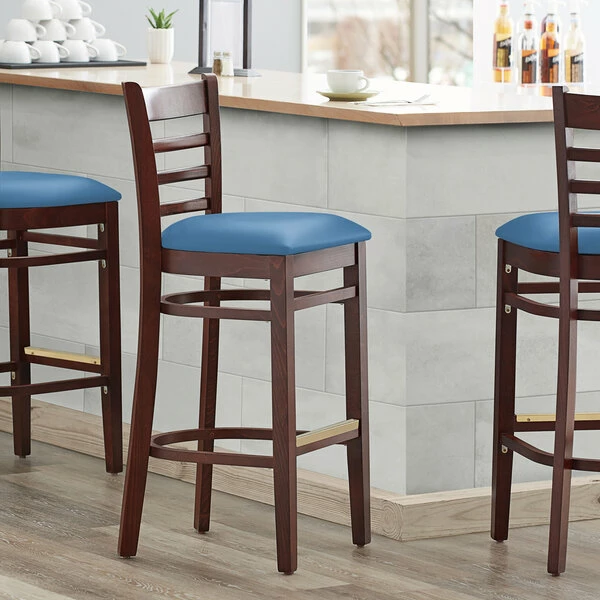 Lancaster Table & Seating Mahogany Finish Wooden Ladder Back Bar Height Chair With Blue Padded Seat 1 Lancaster Table & Seating Mahogany Finish Wooden Ladder Back Bar Height Chair With Blue Padded Seat