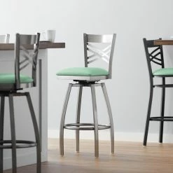 Lancaster Table & Seating Clear Coat Finish Cross Back Swivel Bar Stool With 2 1/2" Seafoam Vinyl Padded Seat