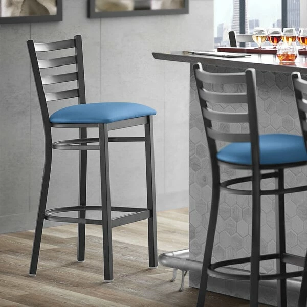 Lancaster Table & Seating Black Finish Ladder Back Bar Stool With 2 1/2" Blue Vinyl Padded Seat 1 Lancaster Table & Seating Black Finish Ladder Back Bar Stool With 2 1/2" Blue Vinyl Padded Seat