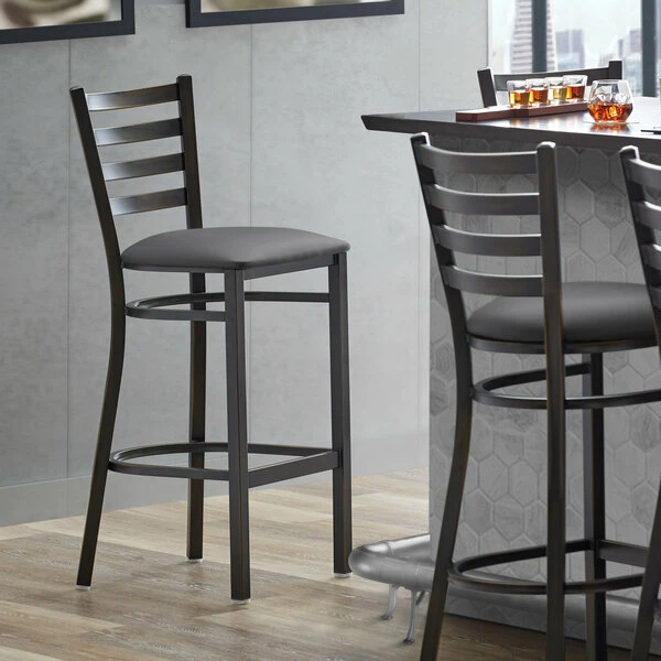 Lancaster Table & Seating Distressed Copper Finish Ladder Back Bar Stool With 2 1/2" Dark Gray Vinyl Padded Seat 1 Lancaster Table & Seating Distressed Copper Finish Ladder Back Bar Stool With 2 1/2" Dark Gray Vinyl Padded Seat