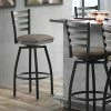 Lancaster Table & Seating Black Finish Ladder Back Swivel Bar Stool With 2 1/2" Taupe Vinyl Padded Seat