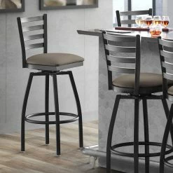Lancaster Table & Seating Black Finish Ladder Back Swivel Bar Stool With 2 1/2" Taupe Vinyl Padded Seat