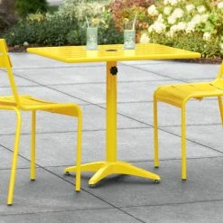 Lancaster Table & Seating 24" X 32" Yellow Powder-Coated Aluminum Dining Height Outdoor Table With Umbrella Hole