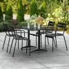 Lancaster Table & Seating 32" X 48" Black Powder-Coated Aluminum Standard Height Outdoor Table With Umbrella Hole And 4 Arm Chairs