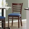 Lancaster Table & Seating Mahogany Finish Wooden Ladder Back Chair With 2 1/2" Navy Padded Seat