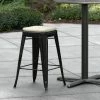 LT&S Alloy Series Lancaster Table & Seating Alloy Series Black Stackable Metal Indoor / Outdoor Industrial Cafe Counter Height Stool With Tan Fabric Magnetic Cushion