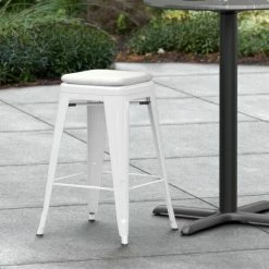 LT&S Alloy Series Lancaster Table & Seating Alloy Series White Stackable Metal Indoor / Outdoor Industrial Cafe Counter Height Stool With Gray Fabric Magnetic Cushion