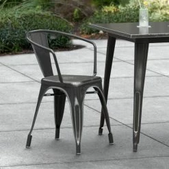 LT&S Alloy Series Lancaster Table & Seating Alloy Series Distressed Black Metal Indoor / Outdoor Industrial Cafe Arm Chair