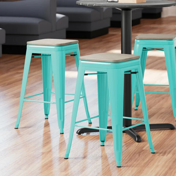 LT&S Alloy Series Lancaster Table & Seating Alloy Series Seafoam Metal Indoor Industrial Cafe Counter Height Stool With Gray Wood Seat 1 LT&S Alloy Series Lancaster Table & Seating Alloy Series Seafoam Metal Indoor Industrial Cafe Counter Height Stool With Gray Wood Seat