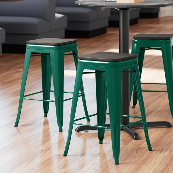 LT&S Alloy Series Lancaster Table & Seating Alloy Series Emerald Metal Indoor Industrial Cafe Counter Height Stool With Black Wood Seat 1 LT&S Alloy Series Lancaster Table & Seating Alloy Series Emerald Metal Indoor Industrial Cafe Counter Height Stool With Black Wood Seat
