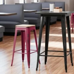 LT&S Alloy Series Lancaster Table & Seating Alloy Series Distressed Sangria Stackable Metal Indoor Industrial Barstool With Natural Wood Seat