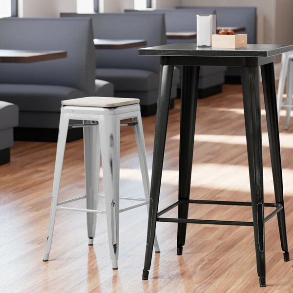 LT&S Alloy Series Lancaster Table & Seating Alloy Series Distressed Silver Stackable Metal Indoor Industrial Barstool With Gray Wood Seat 1 LT&S Alloy Series Lancaster Table & Seating Alloy Series Distressed Silver Stackable Metal Indoor Industrial Barstool With Gray Wood Seat