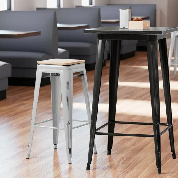 LT&S Alloy Series Lancaster Table & Seating Alloy Series Distressed Silver Stackable Metal Indoor Industrial Barstool With Natural Wood Seat 1 LT&S Alloy Series Lancaster Table & Seating Alloy Series Distressed Silver Stackable Metal Indoor Industrial Barstool With Natural Wood Seat