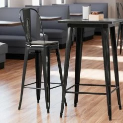 LT&S Alloy Series Lancaster Table & Seating Alloy Series Distressed Black Metal Indoor Industrial Cafe Bar Height Stool With Vertical Slat Back And Black Wood Seat