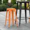 LT&S Alloy Series Lancaster Table & Seating Alloy Series Distressed Orange Stackable Metal Indoor / Outdoor Industrial Barstool With Drain Hole Seat