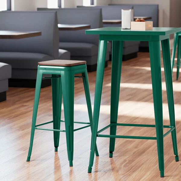 LT&S Alloy Series Lancaster Table & Seating Alloy Series Emerald Stackable Metal Indoor Industrial Barstool With Walnut Wood Seat 1 LT&S Alloy Series Lancaster Table & Seating Alloy Series Emerald Stackable Metal Indoor Industrial Barstool With Walnut Wood Seat