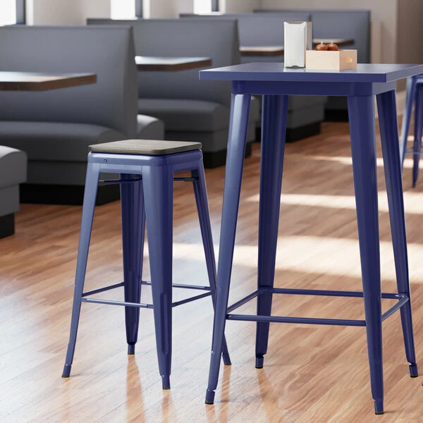 LT&S Alloy Series Lancaster Table & Seating Alloy Series Navy Stackable Metal Indoor Industrial Barstool With Black Wood Seat 1 LT&S Alloy Series Lancaster Table & Seating Alloy Series Navy Stackable Metal Indoor Industrial Barstool With Black Wood Seat