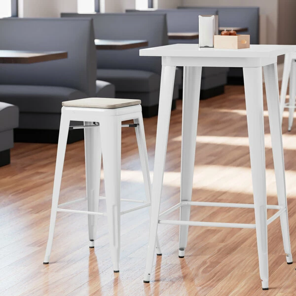 LT&S Alloy Series Lancaster Table & Seating Alloy Series White Stackable Metal Indoor Industrial Barstool With Gray Wood Seat 1 LT&S Alloy Series Lancaster Table & Seating Alloy Series White Stackable Metal Indoor Industrial Barstool With Gray Wood Seat