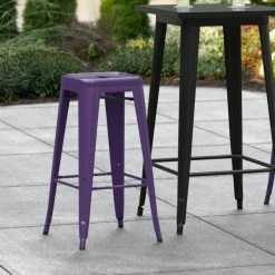 LT&S Alloy Series Lancaster Table & Seating Alloy Series Purple Stackable Metal Indoor / Outdoor Industrial Barstool With Drain Hole Seat