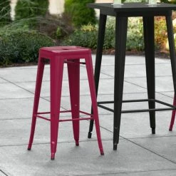LT&S Alloy Series Lancaster Table & Seating Alloy Series Sangria Stackable Metal Indoor / Outdoor Industrial Barstool With Drain Hole Seat