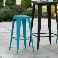 LT&S Alloy Series Lancaster Table & Seating Alloy Series Teal Stackable Metal Indoor / Outdoor Industrial Barstool With Drain Hole Seat